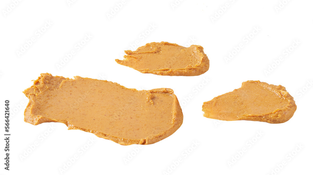 smears and splashes of peanut butter isolated on white background. smears and splashes of peanut butter isolated on white background.