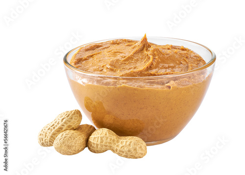 Glass bowl of peanut butter with peanuts isolated on white background