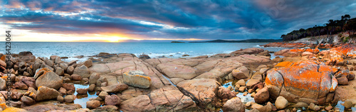 Panoramic view of colorful granite rocks on coastline of Coles Bay, Freycinet Peninsula, Tasmania, Australia photo