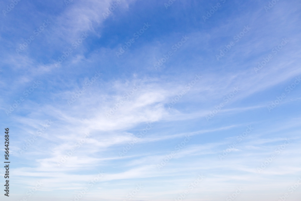 The vast sky and the white clouds float in the sky. The natural blue background has a breeze on a bright day in the summer.The sky and clouds are not the same shape as the weather.
