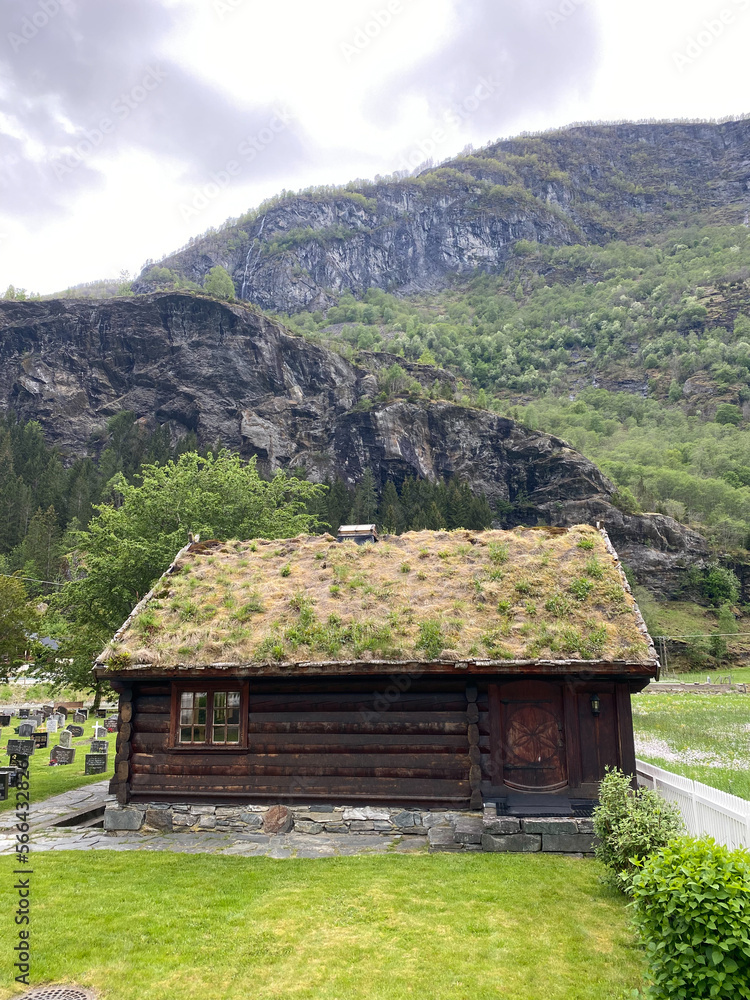 old house with grass roof in the mountains