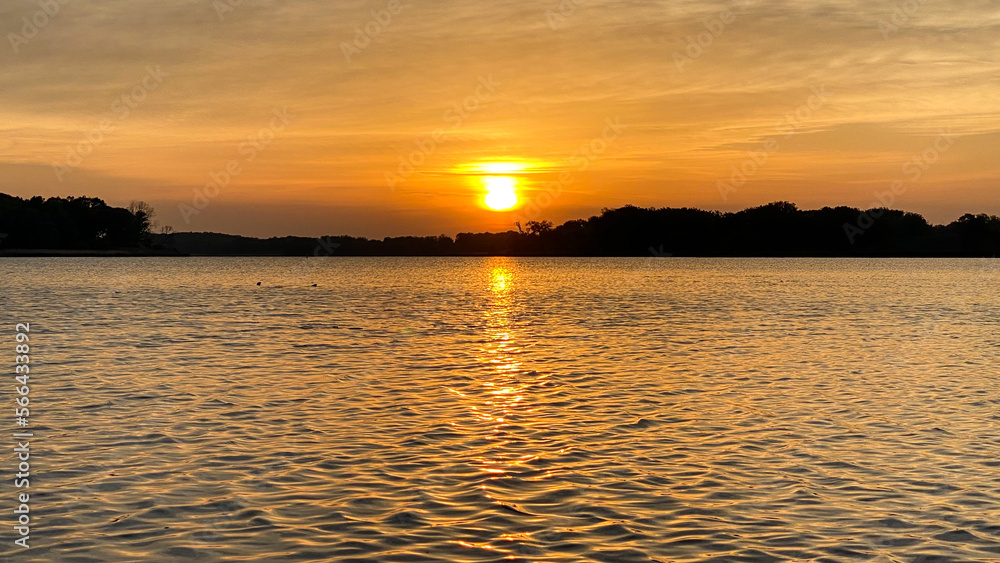 sunrise over the lake while kayaking sunrise over the lake while kayaking