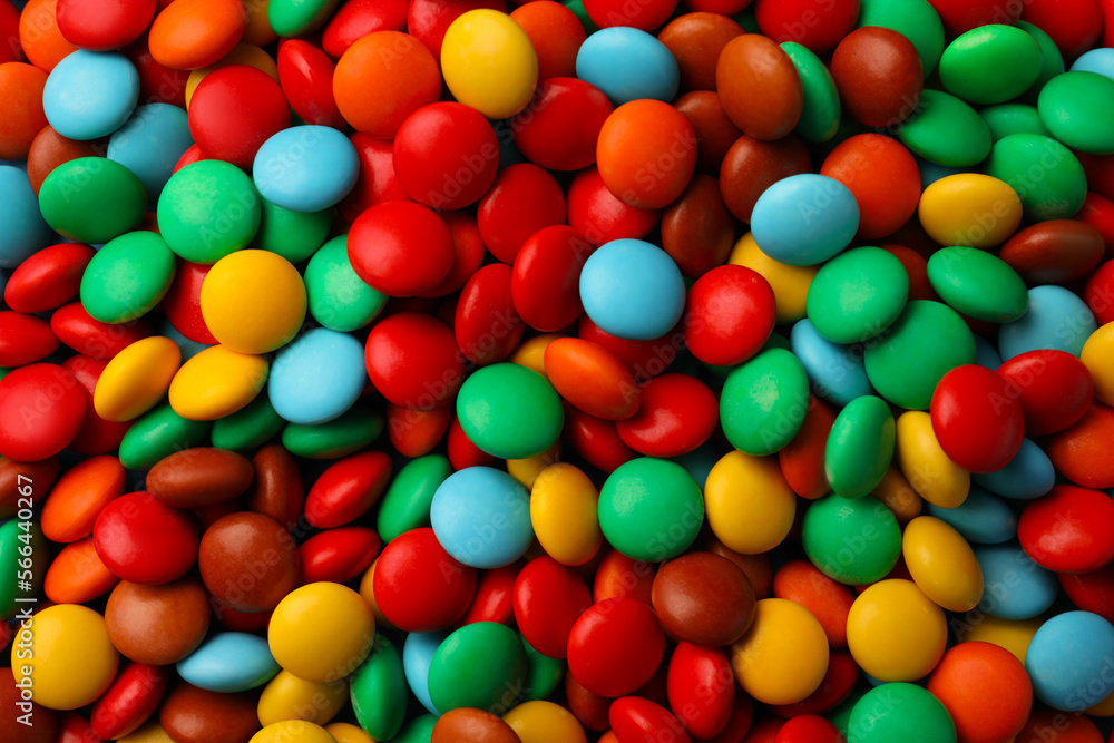 Obraz premium Tasty colorful candies as background, top view