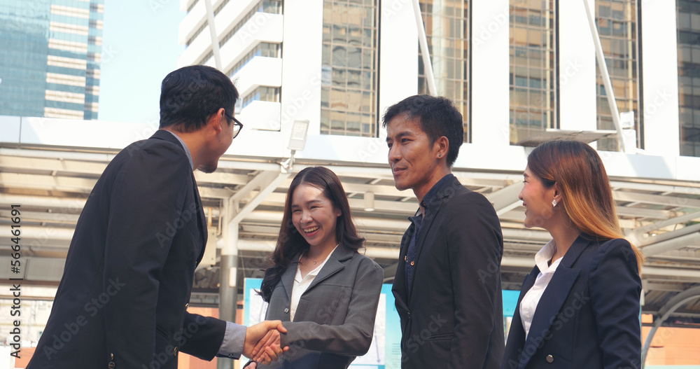Fototapeta premium Diversity Business Partner meeting trust in teamwork and partnership businessman, businesswoman talking together in modern city. Asian coworker team meeting with Business People Working Together Team