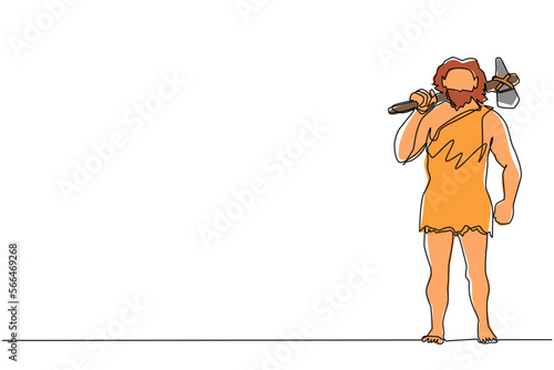Single continuous line drawing stone age primitive man in animal hide pelt with stone axe. Prehistoric man holding stone axe on shoulders. Dynamic one line draw graphic design vector illustration