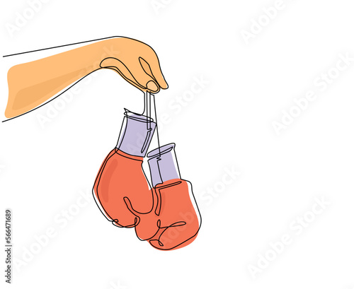 Single one line drawing boxer hand holds pair of boxing gloves. Man hand in sporty style holds red leather boxing gloves on white background. Continuous line draw design graphic vector illustration