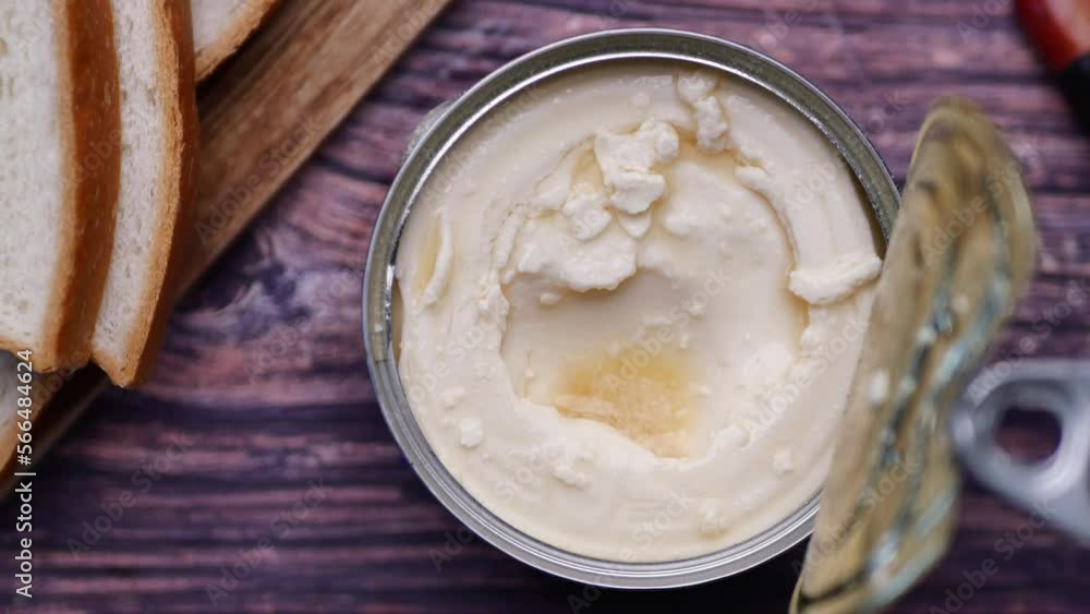 top view of milk cream in a container on table top view of milk cream in a container on table