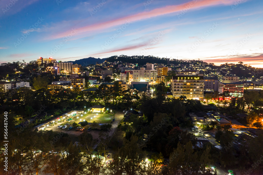 Baguio City, Philippines -  Evening aerial of Burnham Park and surrounding hotels.