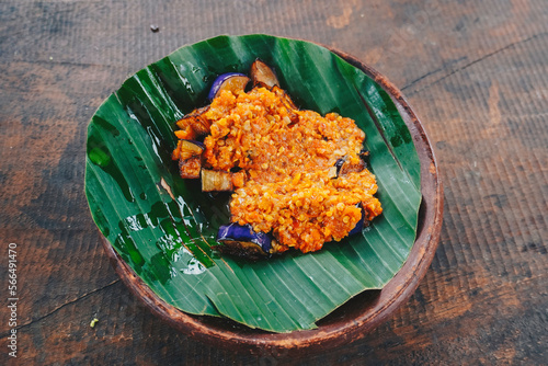 Sambal terong or Spicy Fried Eggplant Delicious traditional food from Indonesia made from eggplant and Chilies. photo