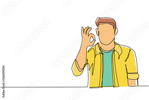 Continuous one line drawing man in casual clothes gesturing ok sign. Okay sign, gesture language concept. Smiling man standing showing ok sign with fingers. Single line draw design vector illustration