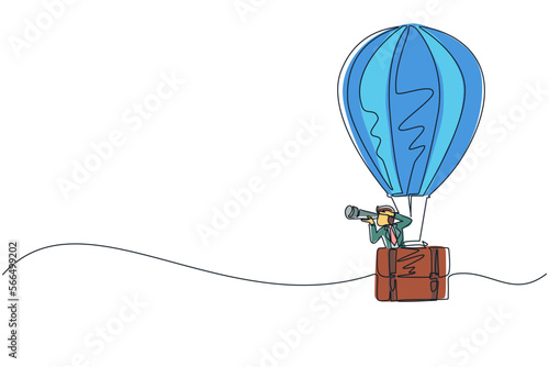 Single continuous line drawing businessman looking through telescope in hot air balloon briefcase. Man in suitcase balloon search to success. Business travel. One line draw design vector illustration