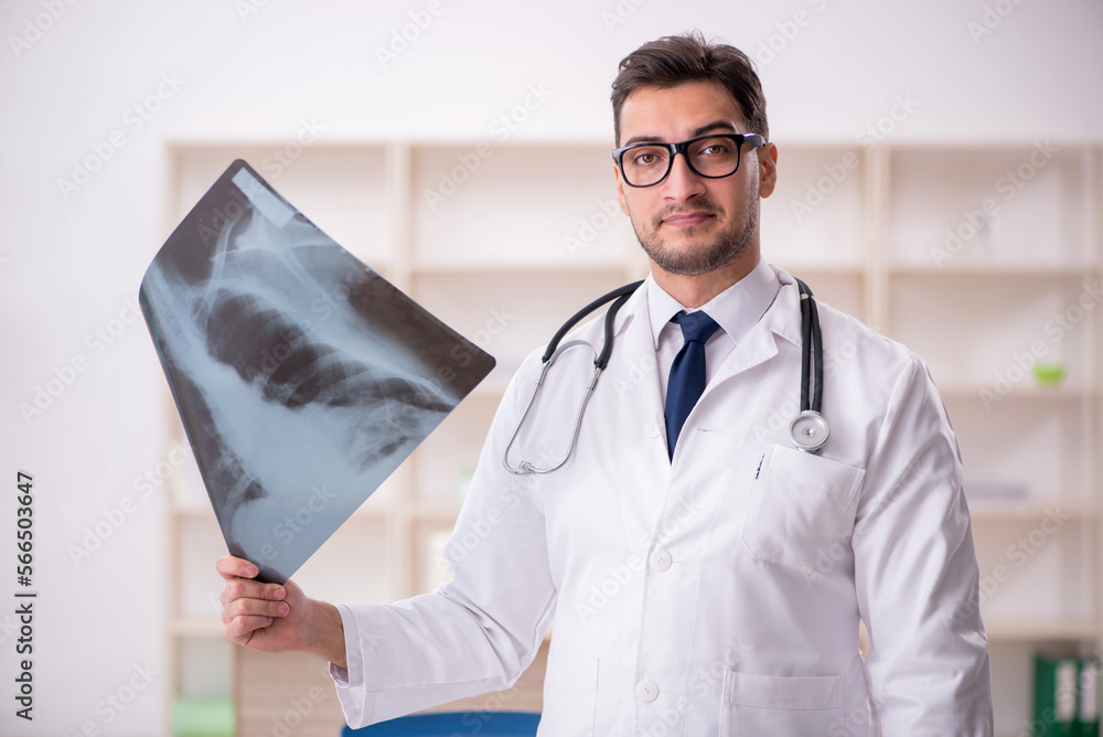 Young male doctor radiologist working in the clinic Young male doctor radiologist working in the clinic
