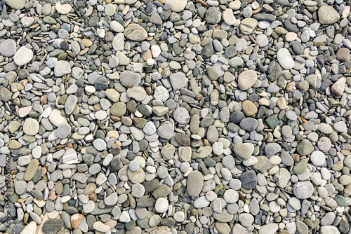 Stones, sea pebbles as a background, texture.