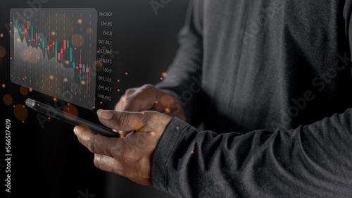 Planning and strategy stock business growth progress or success idea. Businessman or trader’s hand showing graph of browning hologram stock on virtual screen