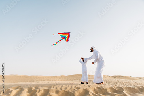 Canvas Print father and son spending time in the desert