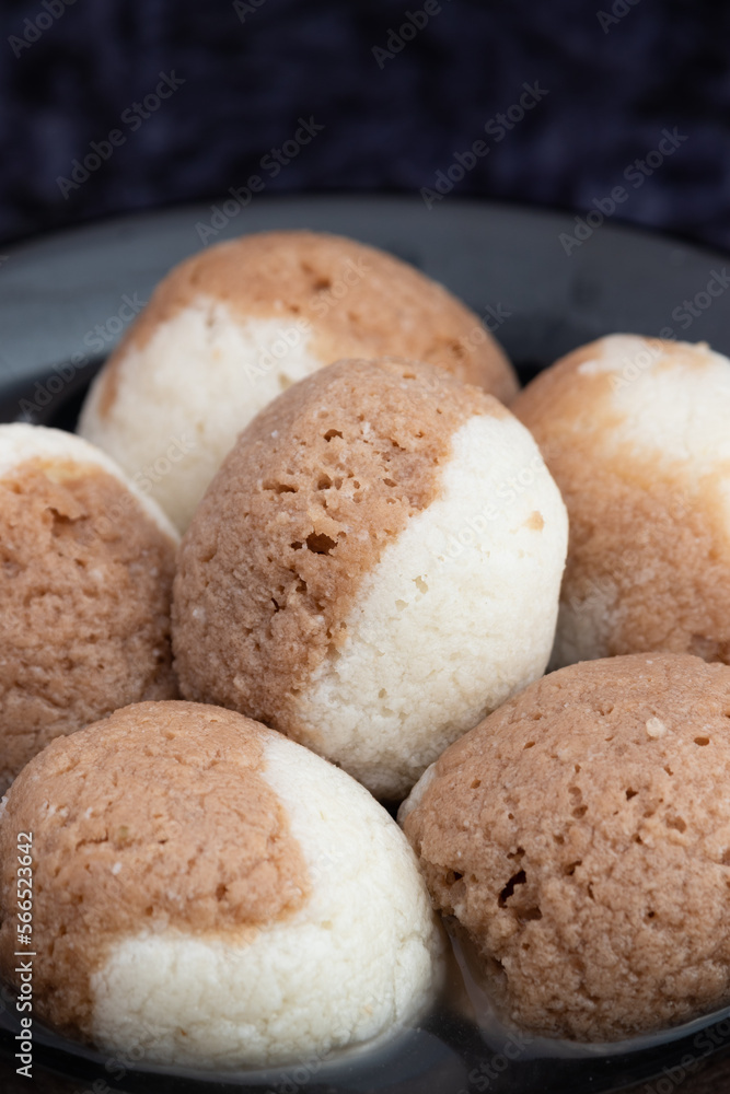 Indian Mithai Chocolate Rasgulla Also Called Choco Gulla, Rasagola, Rosgola, Roshogolla, Rossogolla, Rasbhari Or Rasbari Is Ball Shaped Dumpling Made Of Chhena, Sugar Syrup, Chena, Panir ,Paneer Indian Mithai Chocolate Rasgulla Also Called Choco Gulla, Rasagola, Rosgola, Roshogolla, Rossogolla, Rasbhari Or Rasbari Is Ball Shaped Dumpling Made Of Chhena, Sugar Syrup, Chena, Panir ,Paneer
