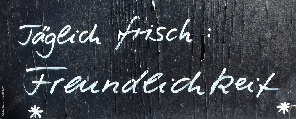 Obraz premium White lettering on black wood . 