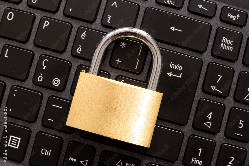 Closed padlock, placed above a pc keyboard. Protection of personal and sensitive data. Privacy. Closed padlock, placed above a pc keyboard. Protection of personal and sensitive data. Privacy.