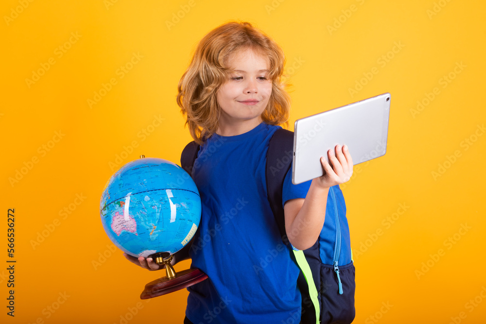 School boy world globe and tablet. School child. Kid boy from elementary school. Pupil go study. Clever schoolboy learning. Kids study, knowledge and education. School boy world globe and tablet. School child. Kid boy from elementary school. Pupil go study. Clever schoolboy learning. Kids study, knowledge and education.