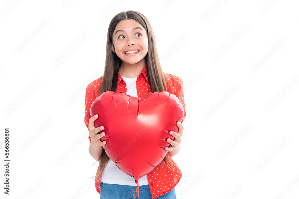 Young teenager child girl with heart shape. Happy Valentines Day. Love and pleasant feelings concept. Portrait of emotional amazed excited teen girl. Young teenager child girl with heart shape. Happy Valentines Day. Love and pleasant feelings concept. Portrait of emotional amazed excited teen girl.
