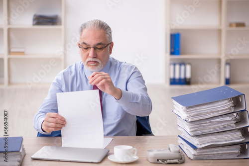 Old male employee and too much work at workplace