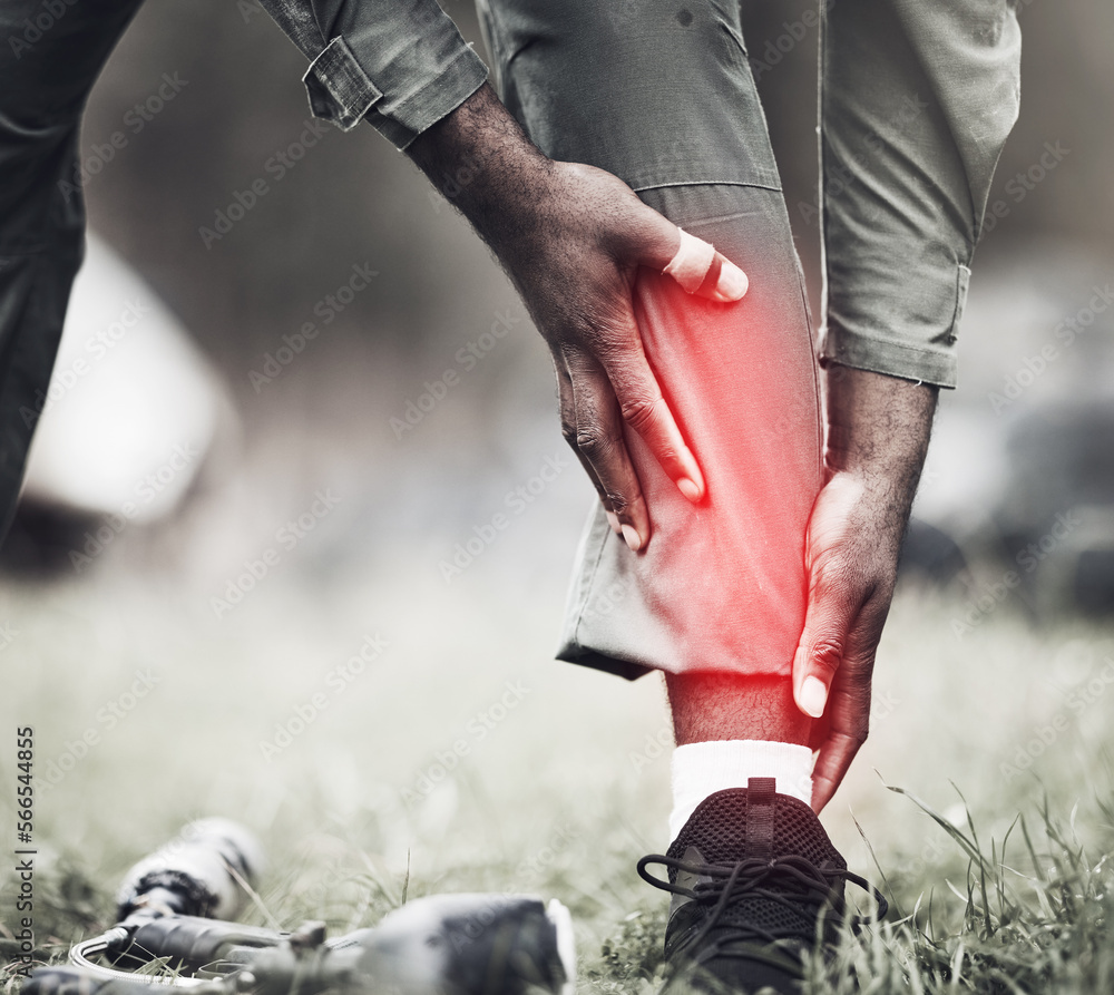 Leg injury, military fitness and black man soldier on a field with joint pain from exercise drill. Sports run, medical emergency and military performance accident in war with blurred background