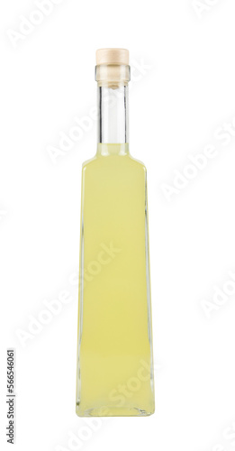 Limoncello or limoncino is an Italian lemon liqueur, yellow alcoholic drink in tall glass bottle. photo