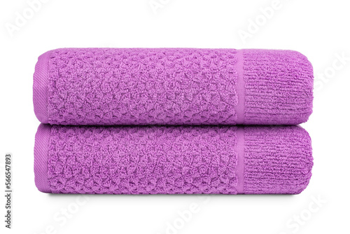 multicolored terry towels, rolled up and stacked on the table