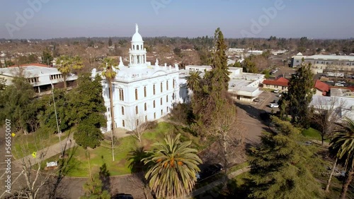 aerial slow push into the merced county courthouse in merced california photo