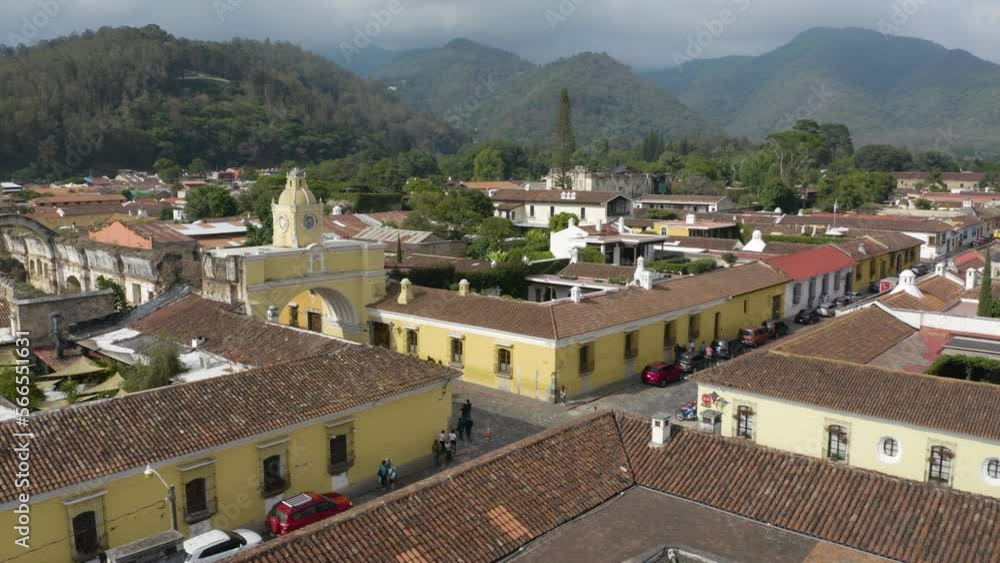 Cinematic Establishing Shot of Santa Catalina Arch in Antigua, Guatemala. Pickup Truck Drives through Arch Cinematic Establishing Shot of Santa Catalina Arch in Antigua, Guatemala. Pickup Truck Drives through Arch
