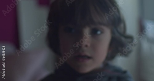 Cinematic close-up of 4-year-old Caucasian boy smiling at 4k camera. Slow Motion.
