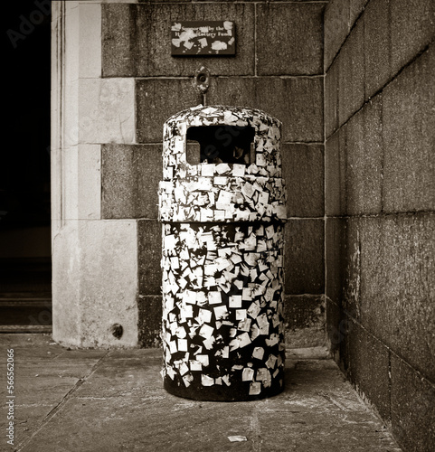 Trashcan with stickers. photo