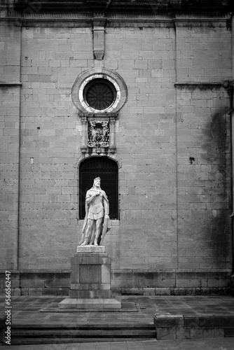 A statue guards the facade of the cathedral in Oviedo, Spain. photo