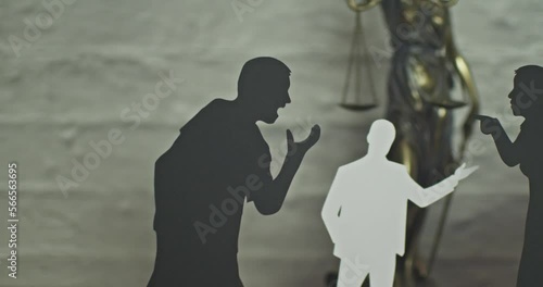 Silhouettes of couples discussing property rights with a mediator. Concept of divorce and discussion.