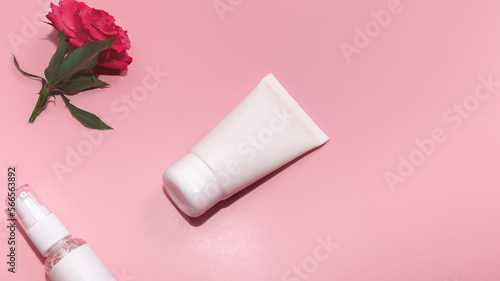 Facial cosmetics, skin care product, natural cosmetics on pink background. Copy space
