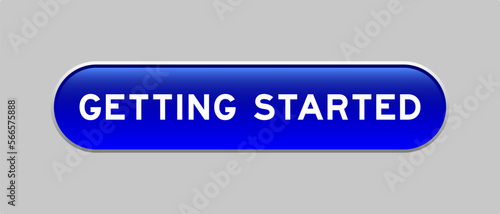 Blue color capsule shape button with word getting started on gray background