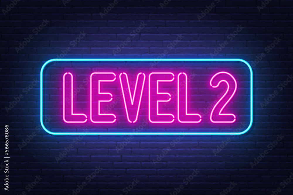Level 2 neon sign on brick wall background. Level 2 neon sign on brick wall background.