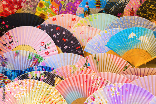 Traditional Geisha style hand held fans on display for tourists.
