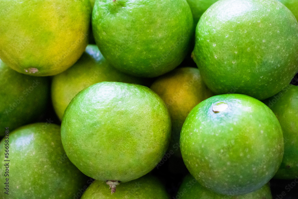 Fresh ripe green limes as background Fresh ripe green limes as background