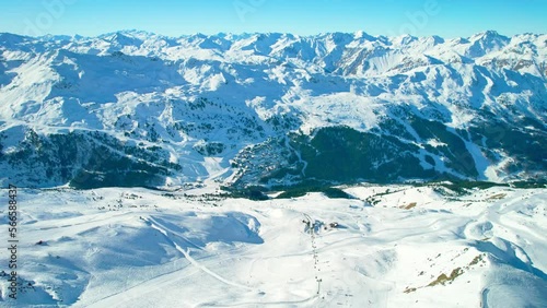 Meribel, France: Aerial view of famous ski resort in French Alps (Savoie Alps) mountains in winter, sunny day with lot of snow - landscape panorama of Europe from above photo