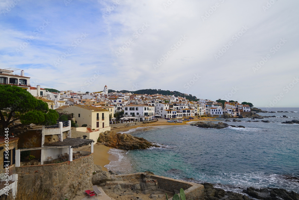 view along the promenade at the Mediterranean Sea and the beautiful fishing town Callela de Palafrugell at the morning, Costa Brava, Catalonia, Spain