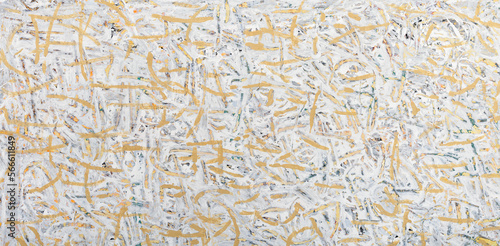 Abstract pattern texture with beige multidirectional strokes on the canvas.