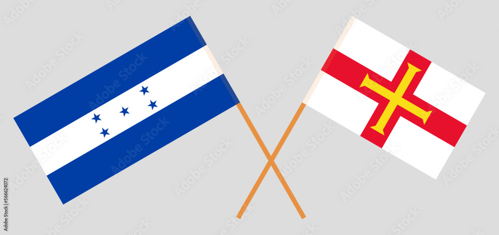 Crossed flags of Honduras and Bailiwick of Guernsey. Official colors. Correct proportion