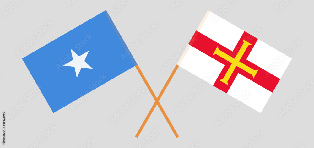 Crossed flags of Somalia and Bailiwick of Guernsey. Official colors. Correct proportion