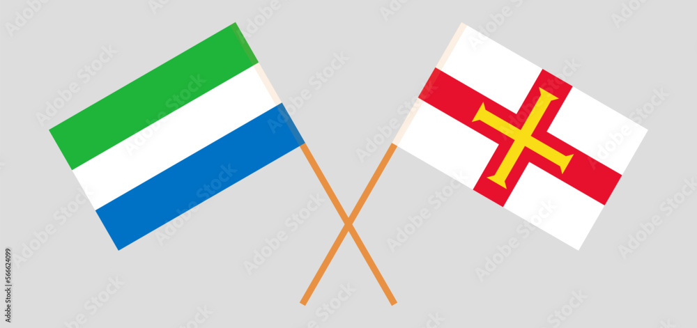 Crossed flags of Sierra Leone and Bailiwick of Guernsey. Official colors. Correct proportion