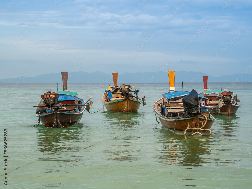fishing boats between islands in the sea fishing boats between islands in the sea