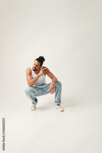 Mind set and mental health. Young man posing indoor on white background.
