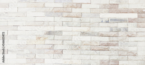 The abstract texture of the cladding stone wall surface. for background design fill text