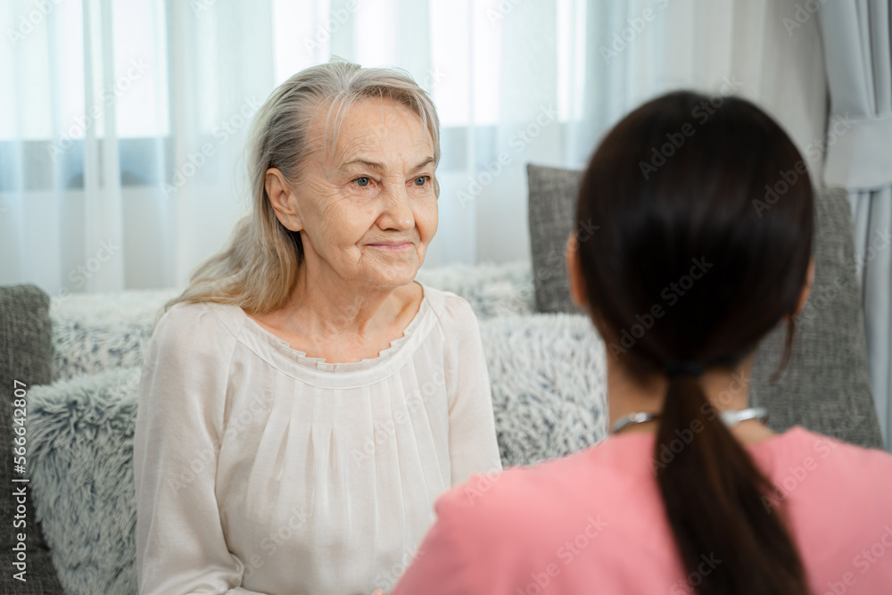 Friendly nurse supporting senior lady at nursing home,Senior services and geriatric care concept. Friendly nurse supporting senior lady at nursing home,Senior services and geriatric care concept.