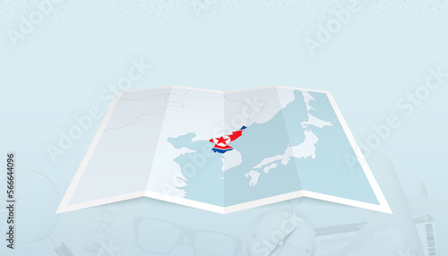 Map of North Korea with the flag of North Korea in the contour of the map on a trip abstract backdrop.